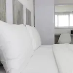 Modern Look Studio Apartment At Grand Asia Afrika By Travelio
