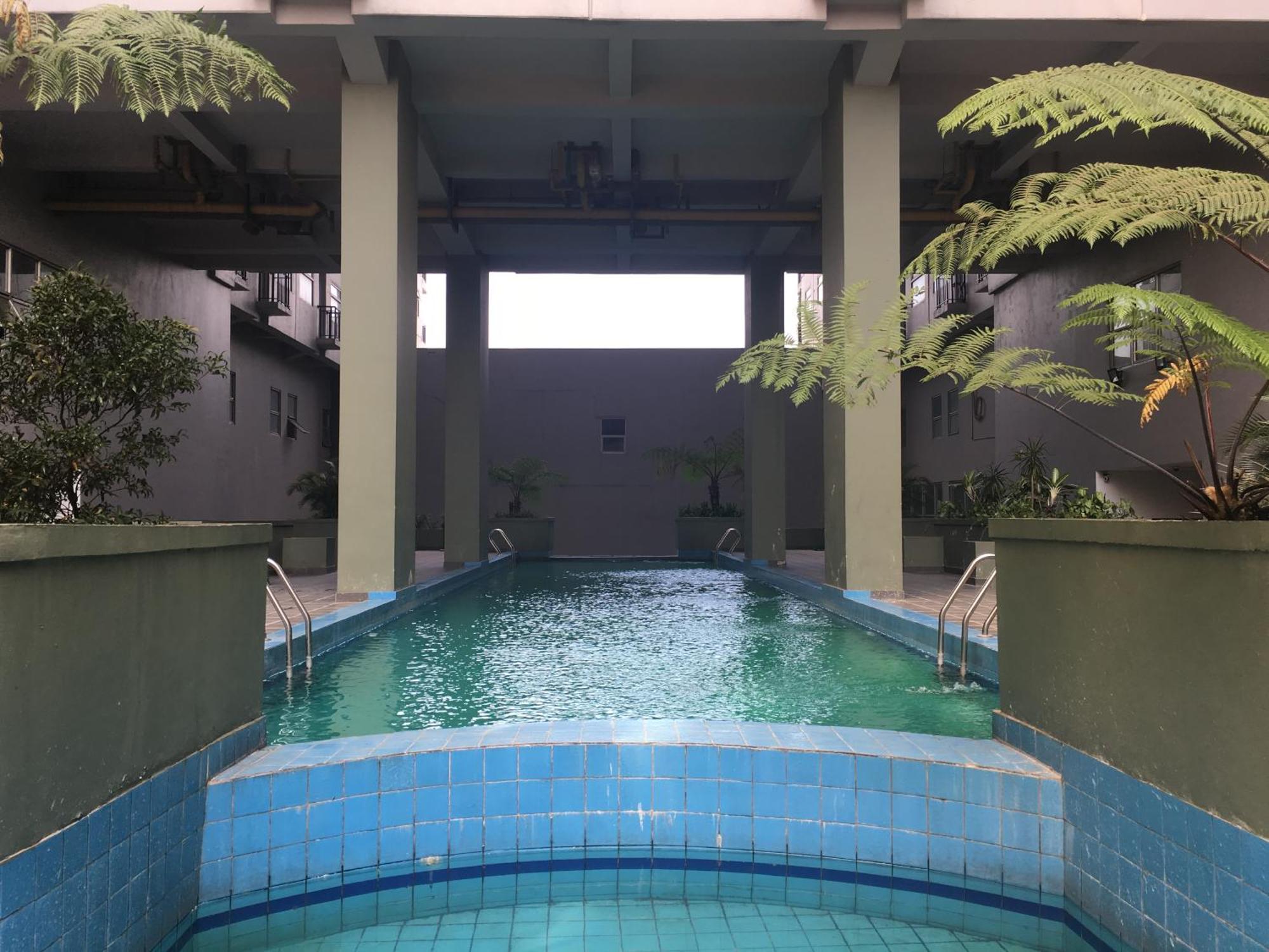 Modern Look At Grand Afrika By Travelio * Bandung