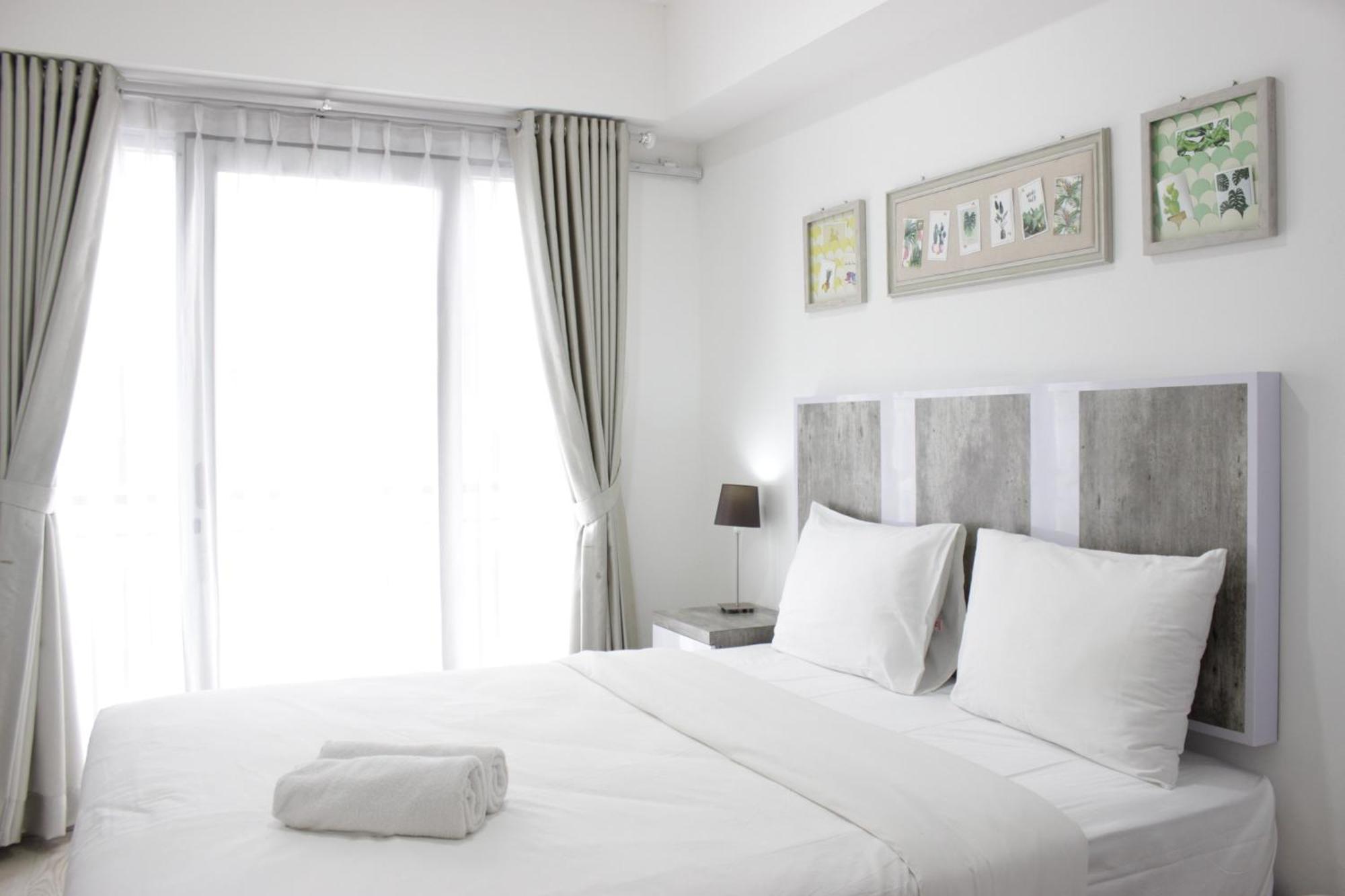 Modern Look At Grand Afrika By Travelio * Bandung